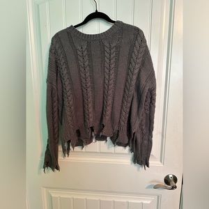 Cute distressed sweater small